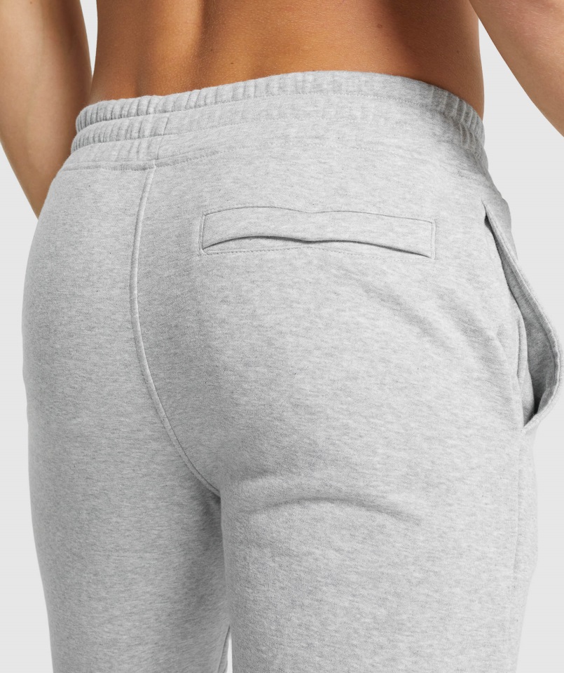 Joggers Gymshark Gris Claro Core Jaspeado Con Escudo