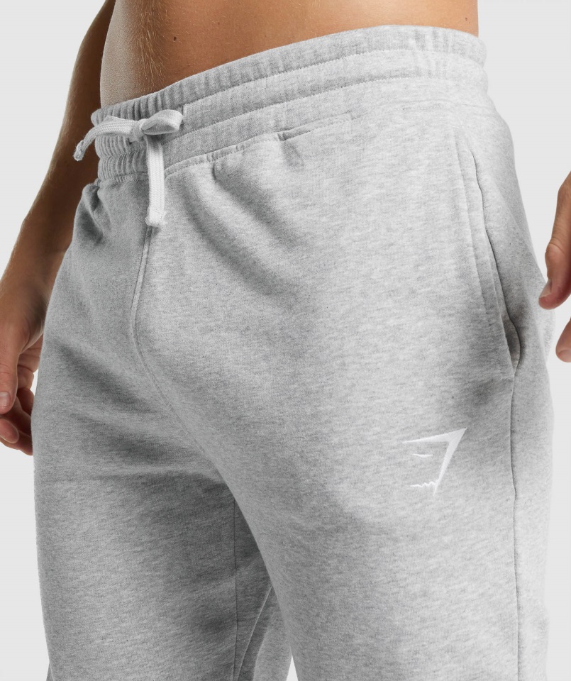 Joggers Gymshark Gris Claro Core Jaspeado Con Escudo