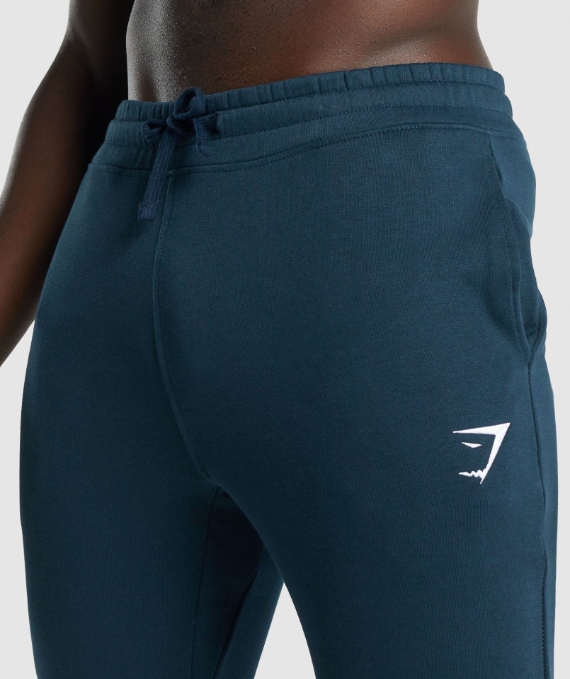 Joggers Gymshark Con Escudo Azul Marino