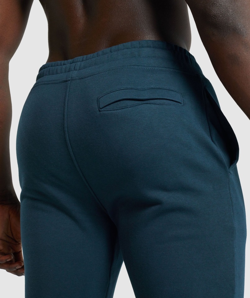 Joggers Gymshark Con Escudo Azul Marino