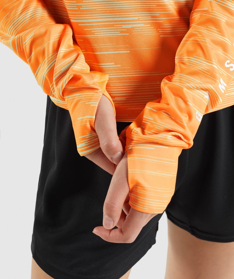 Camiseta Deportiva Holgada De Manga Larga Con Estampado Naranja Gymshark