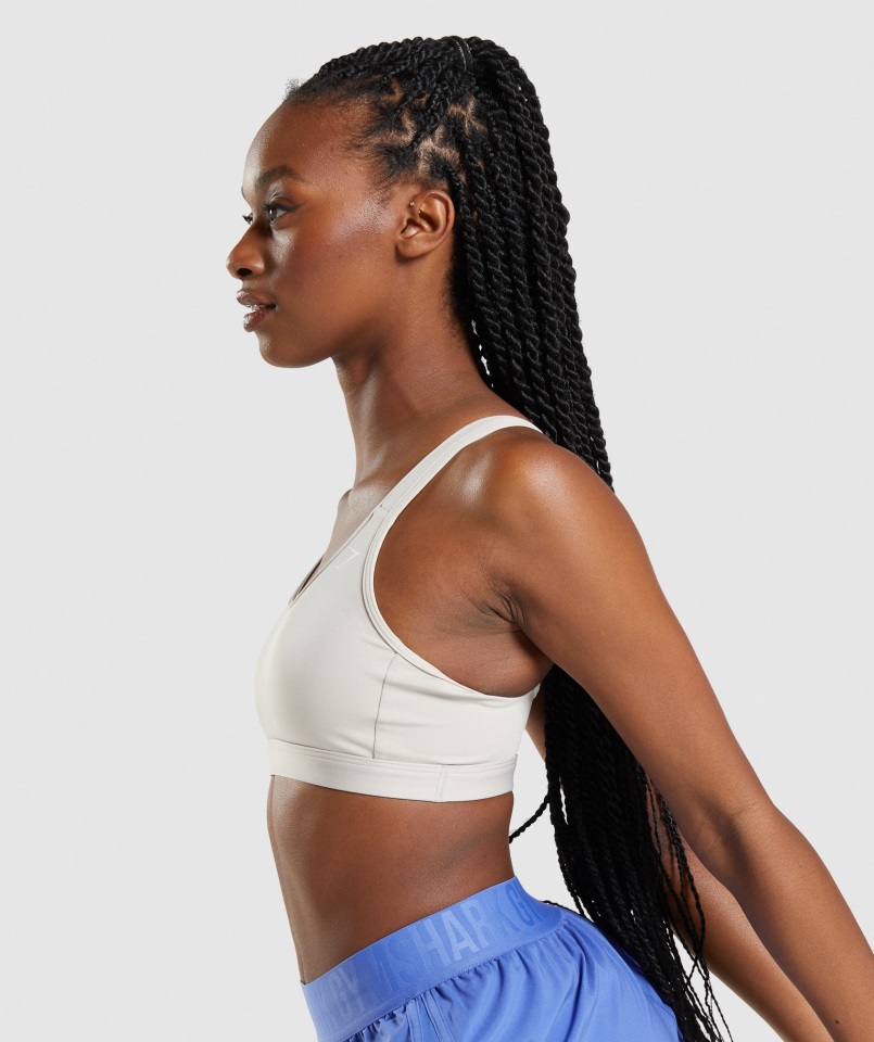 Sujetador Deportivo Con Escote Redondo En Gris Guijarro Gymshark