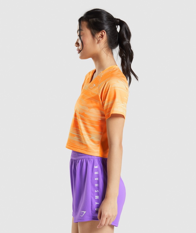 Camiseta Gymshark Sport Midi Estampado Naranja